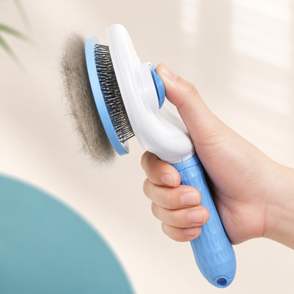 Close-up of Felivana Grooming Brush showing fine metal pins and one-click self-cleaning mechanism
